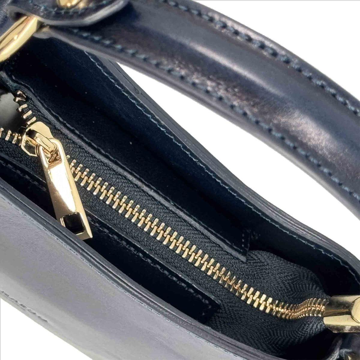Isotta S - Mini borsa mezzaluna in pelle blu